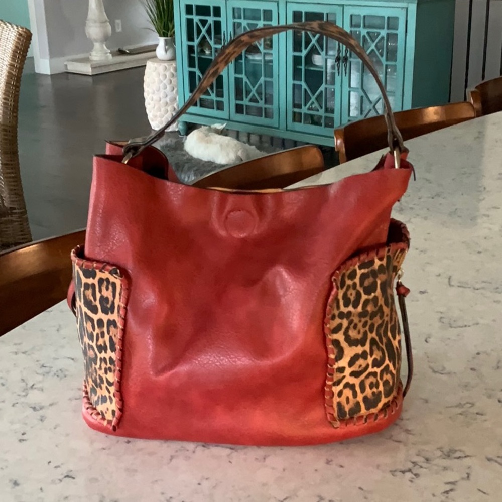 Red faux leather and leopard handbag